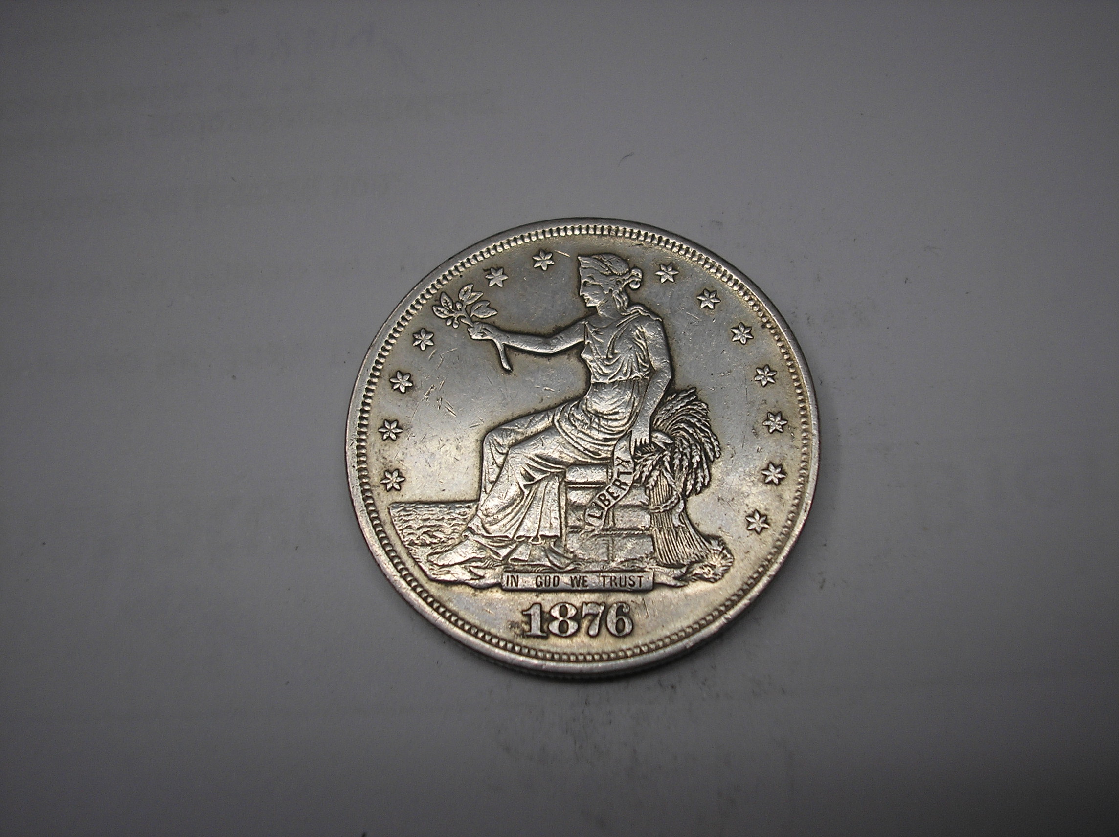 USA,  DOLAR  DE PLATA DE 1876 CC. ¿COPIA?